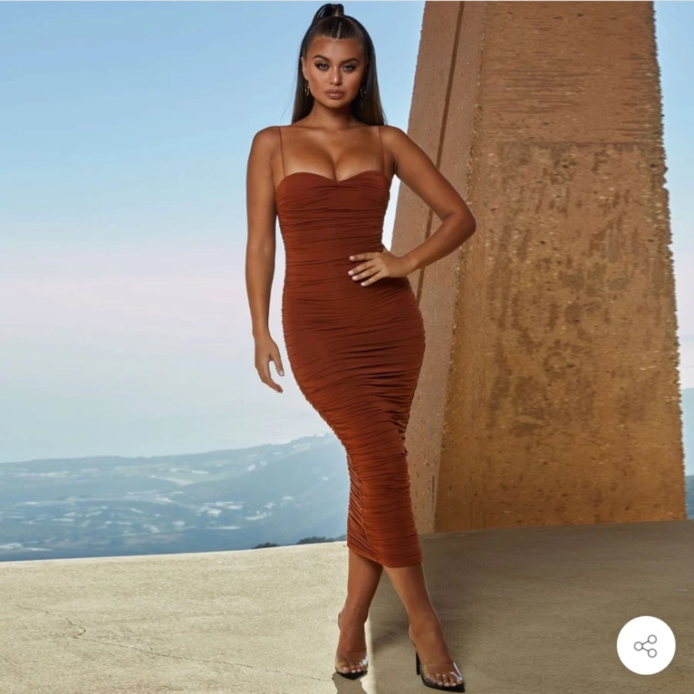 Burgundy long slinky dress. Goes to ankles. Longer than picture shown